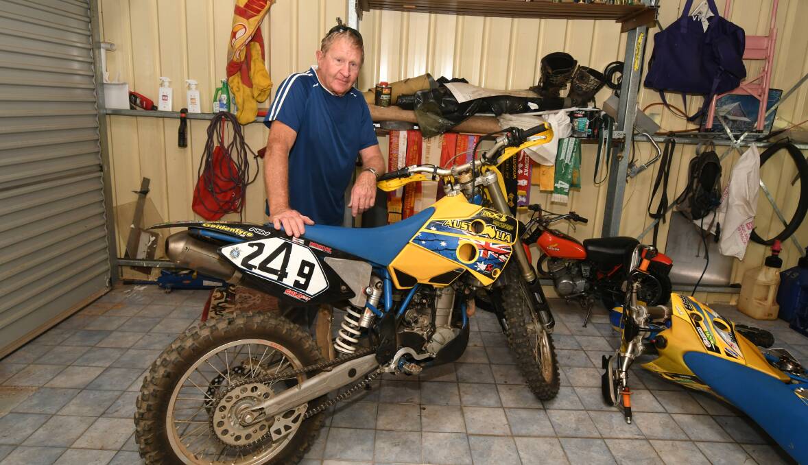 RECOVERED: Barry Collyer with his Husaberg bike that was stolen from his Orange property on Monday. Photo: JUDE KEOGH 1119jkbikes3