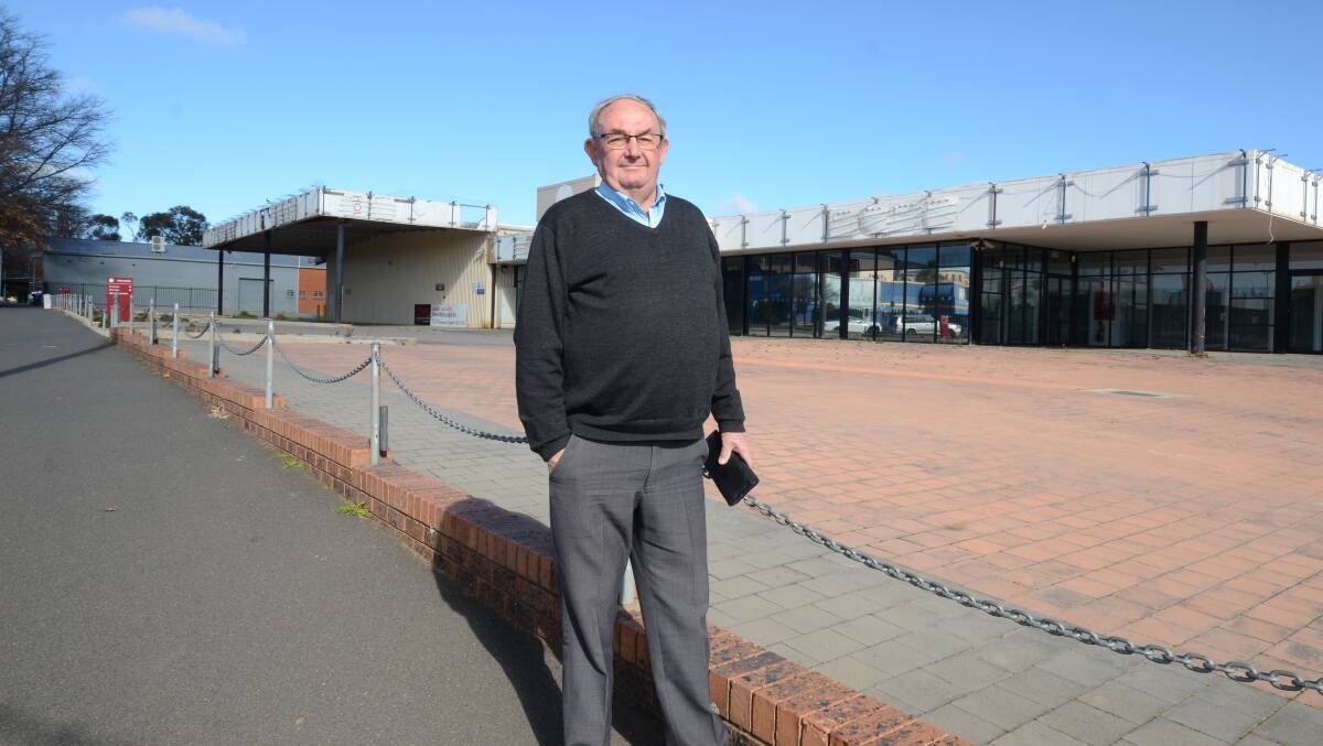FUTURE PLANS: Real estate agent Gary Blowes outside the former Holden dealership on Endsleigh Avenue. Photo: JUDE KEOGH