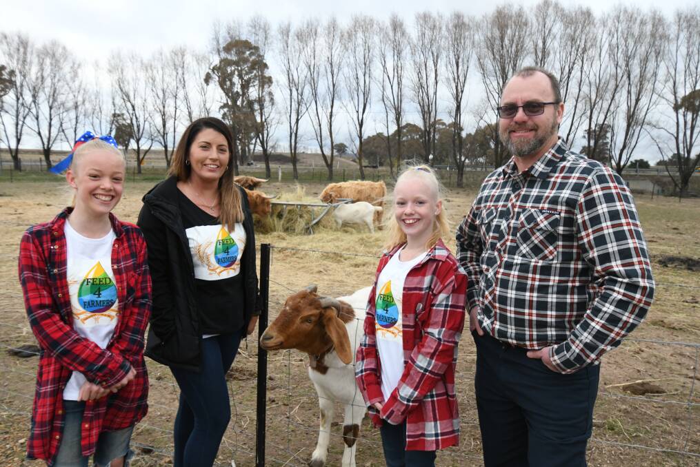 HELPING FARMERS: Mackenzie Palazzi, Rebecca Childs, Eliza 
Palazzi and Stephen Scott-Robertson are backing the farmers' 
fundraising event in Orange. Photo: JUDE KEOGH 0821jkfeed1