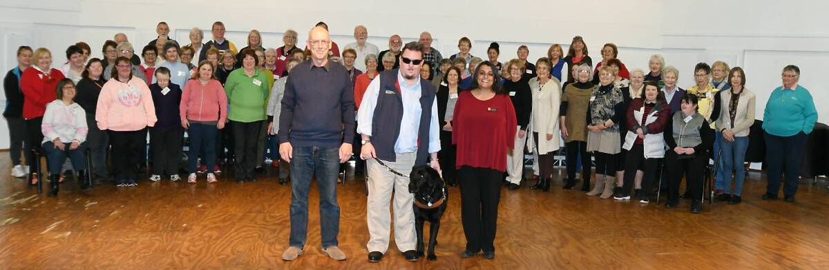 SING OUT LOUD: Ben MacPherson, Matt Bryant, Bronco and Samantha Bartholomeusz and the Come Together Choir who will sing at the fundraiser. Photo: CARLA FREEDMAN 0911cfchoir4