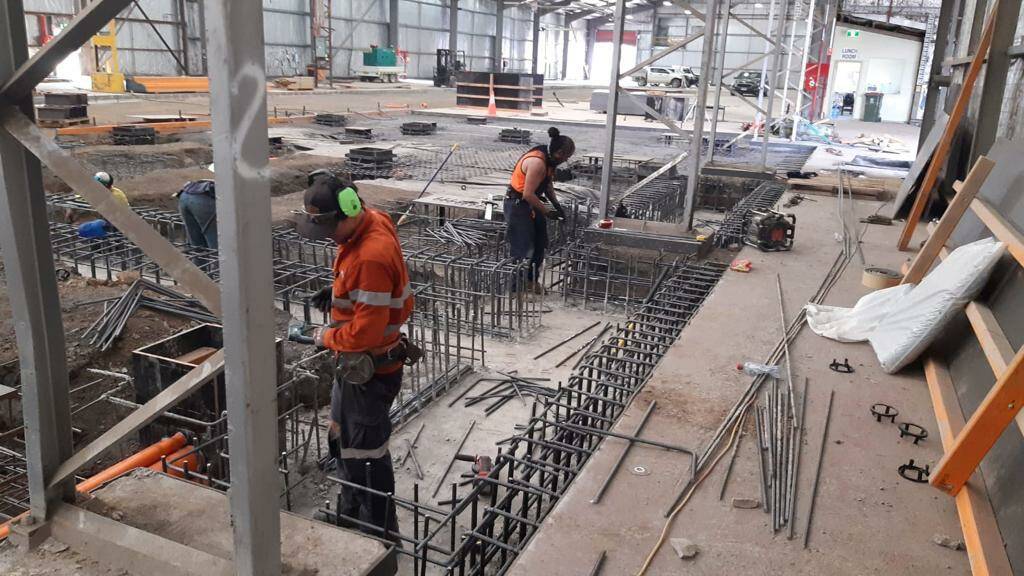 UNDERWAY: Workers begin converting the former Electrolux site into the A-Tech Australia aluminium plant. Photo: Supplied