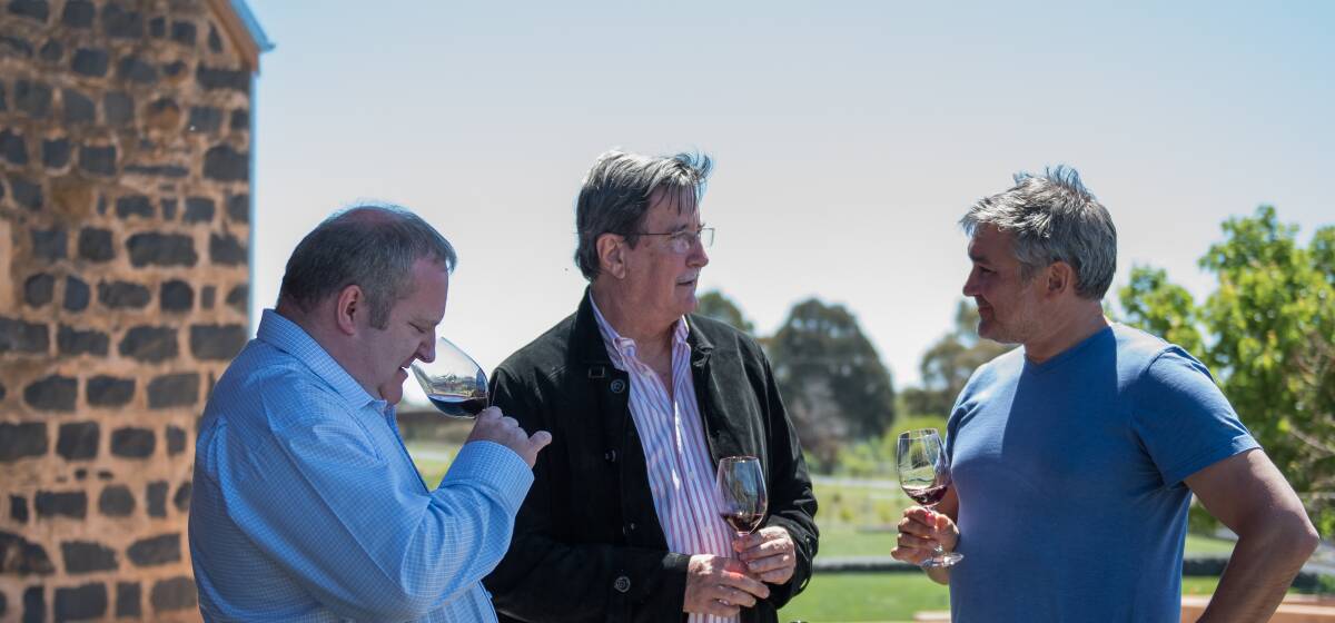 TOP DROP: William Wilson and Geoff Donaghy from the International Convention Centre Sydney with Philip Shaw Wines winemaker Dan Shaw. Photo: Supplied
