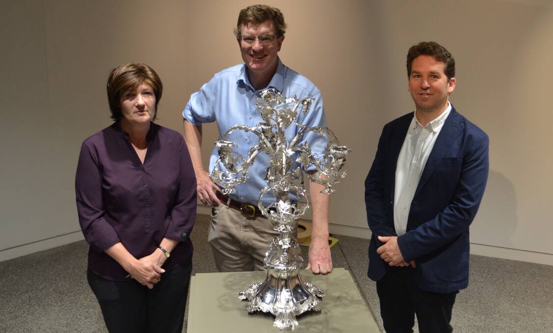 EXQUISITE: Museum manager Alison Russell, Member for Calare Andrew Gee and gallery director Brad Hammond with the Campbell Epergne in Orange. Photo: DAVID FITZSIMONS