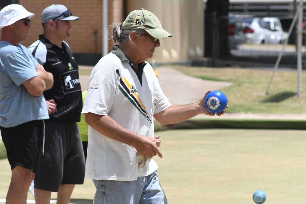 CONCENTRATION: Marty Rickards plays bowls at the Orange City Bowling Club on Saturday. Photo: JUDE KEOGH 1123jkbowls1