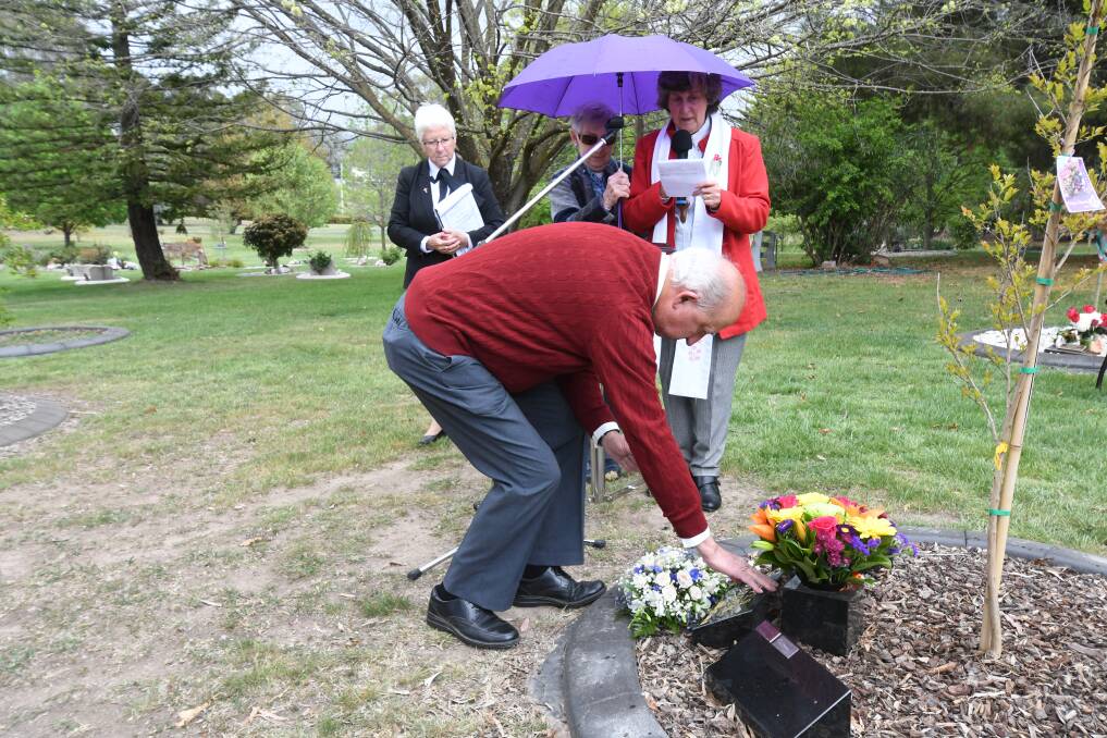 CEREMONY: Reverend Gary Neville blesses the garden. Photo: JUDE KEOGH