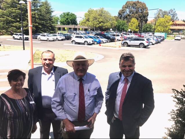 FINISHED: Leeanne Wright WNSWLHD; Cr Sam Romano; Rick Colless and Member for Orange Phil Donato at the car park. Photo: Supplied