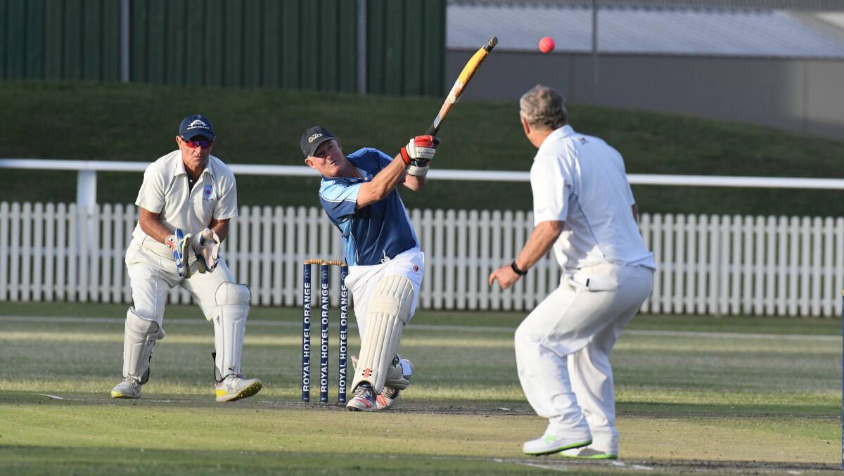 ACTION: The cricket carnival also featured a Twenty20 clash in Orange on Saturday night. Photo: JUDE KEOGH
