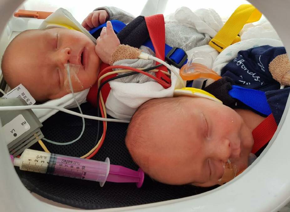 SOUND ASLEEP: The twin boys, Remy and Raffie Webb, are all quiet on their big trip home. Photo: Supplied