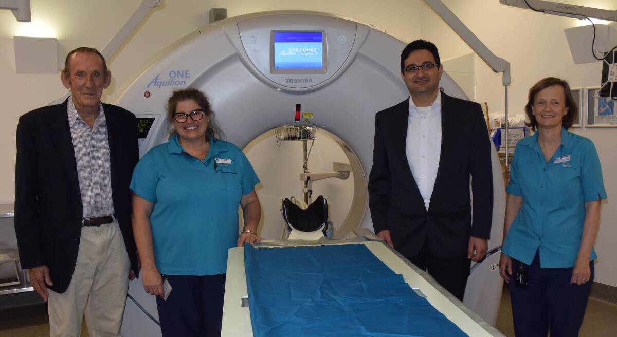 LIFE CHANGING: Randall Wishart, radiographer Kerrie Brammall, Dr Rami Haddad and Fiona Ryan with the CT scanner at Orange hospital. Photo: DAVID FITZSIMONS 1109dfstroke1
