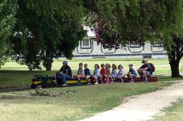 ROLLING ALONG: Take a miniature train ride in Matthews Park on Saturday and enjoy the Historical Society's railway displays. Photo: SUPPLIED