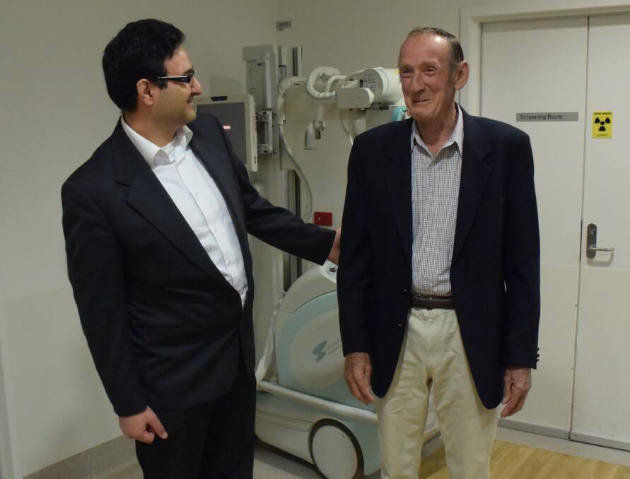 AMAZING RECOVERY: Dr Rami Haddad with stroke sufferer Randall Wishart. Photo: DAVID FITZSIMONS 1109stroke4