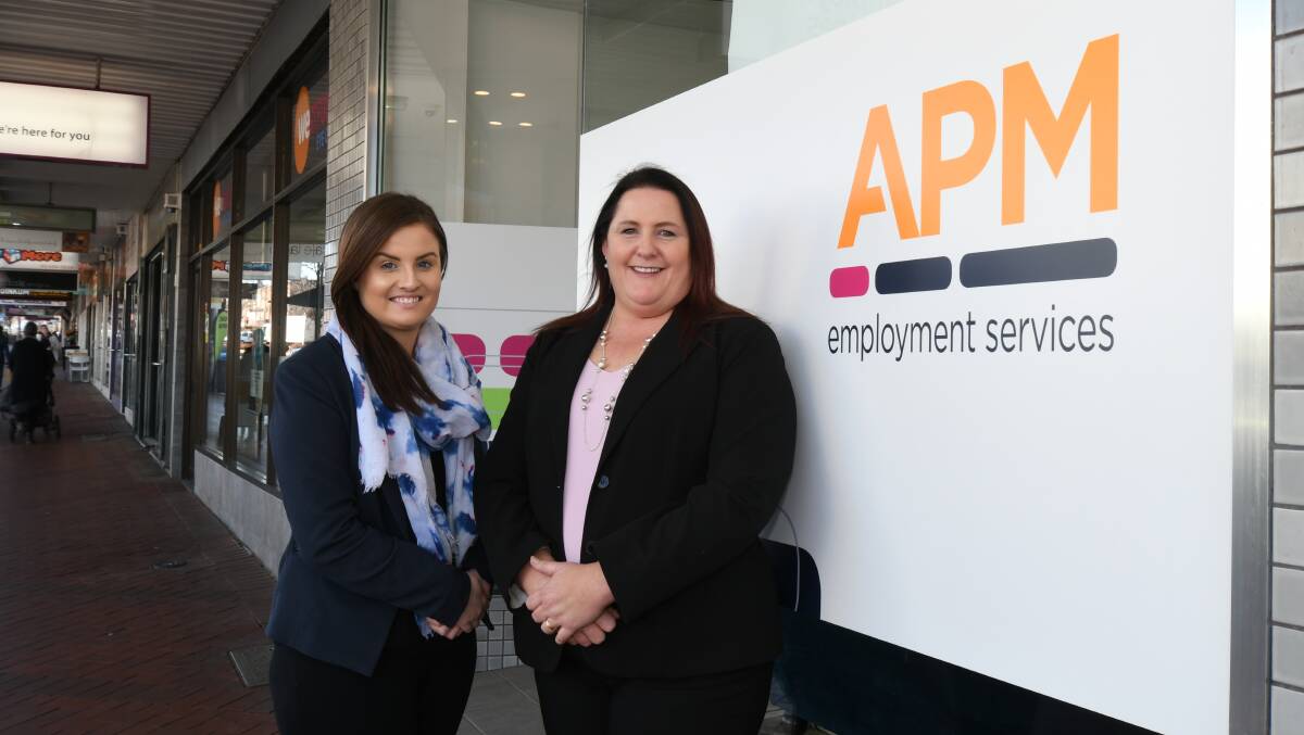 JOB ASSISTANCE: APM Employment Services' Kim Eager and Annette Aggett outside their new premises on Summer Street. Photo: JUDE KEOGH 0802jkapm1