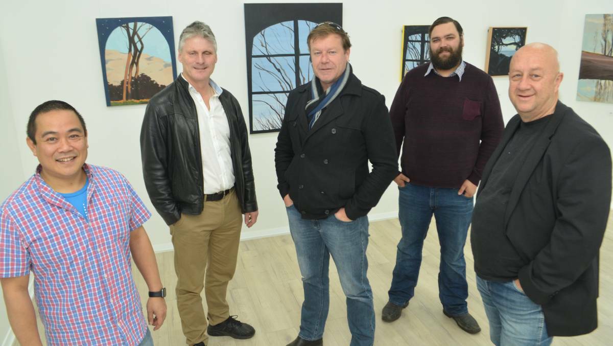 THEATRE AMONG ART: Pinnacle Players owner Peter Young, actors Mark Coster and Nick Tucknott, owner Jeff Thorn and actor Alvaro Marques at the art gallery venue last year.