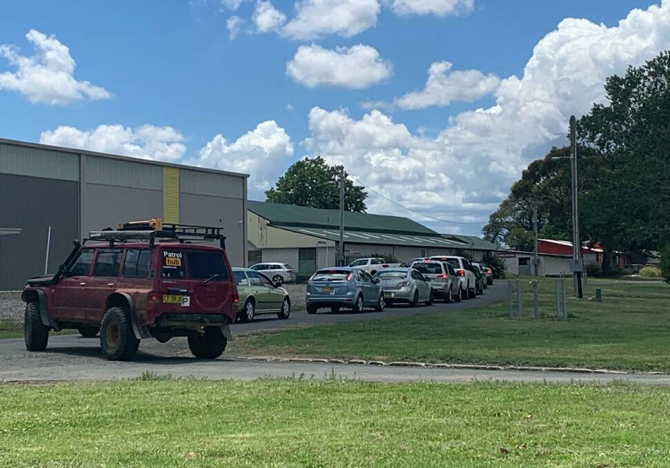 QUEUE: People line up in their cars at the Orange Showground on Tuesday afternoon for COVID testing. Photo: TRACEY PRISK