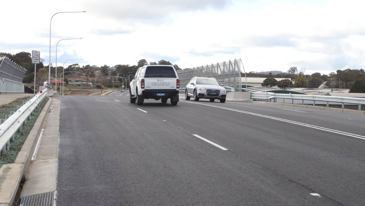 NOW OPEN: Vehicles use the bridge on Sunday. Photo: CARLA FREEDMAN
