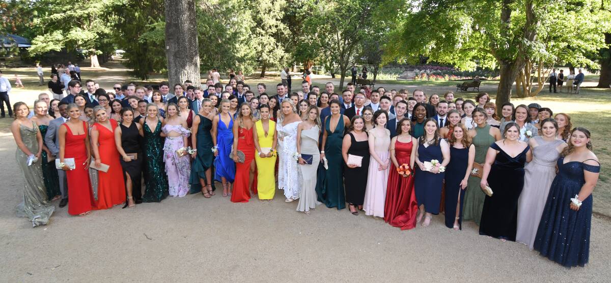 PRE-COVID: Orange High School students pose for their school formal photo in Cook Park last year.