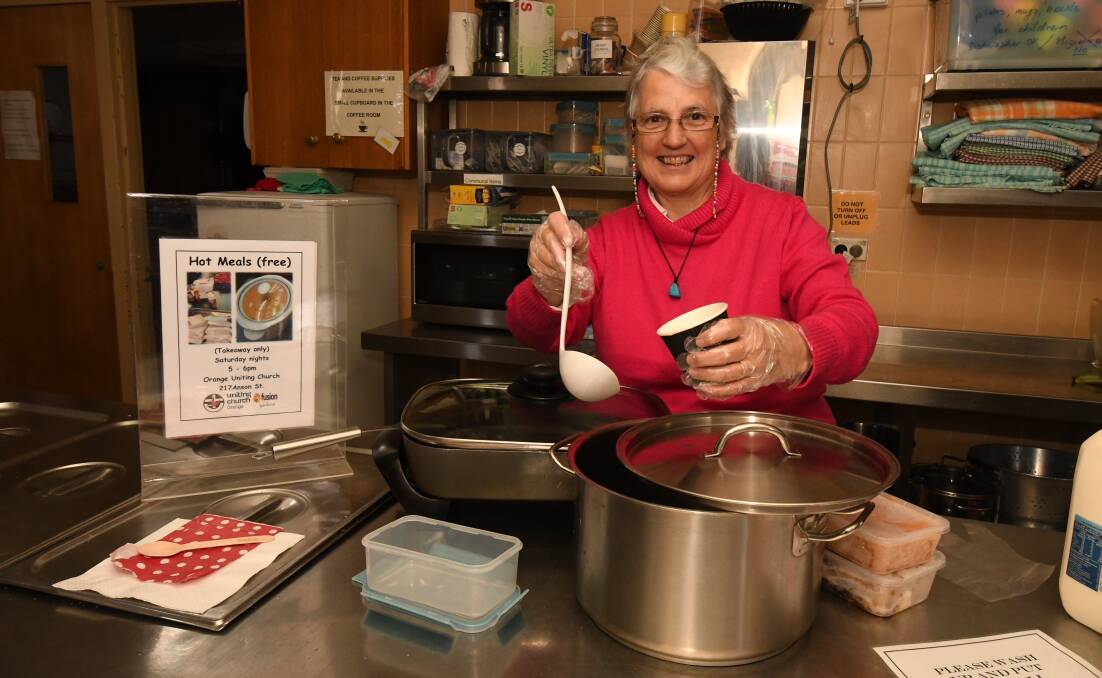 VOLUNTEER: Bev Rankin helps out supplying homeless people in Orange with meals on Saturdays at the Orange Uniting Church. Photo: JUDE KEOGH