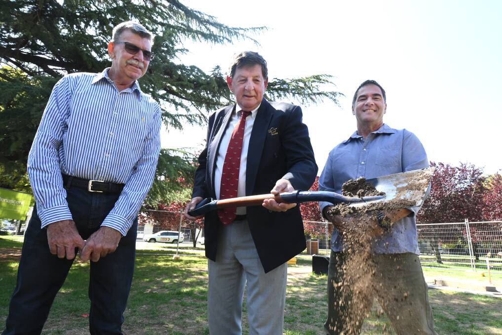 FIRST SOD: Councillors Glenn Taylor, Reg Kidd and Tony Mileto at the ceremonial start to building the controversial toilet block in Robertson Park. Photo: JUDE KEOGH