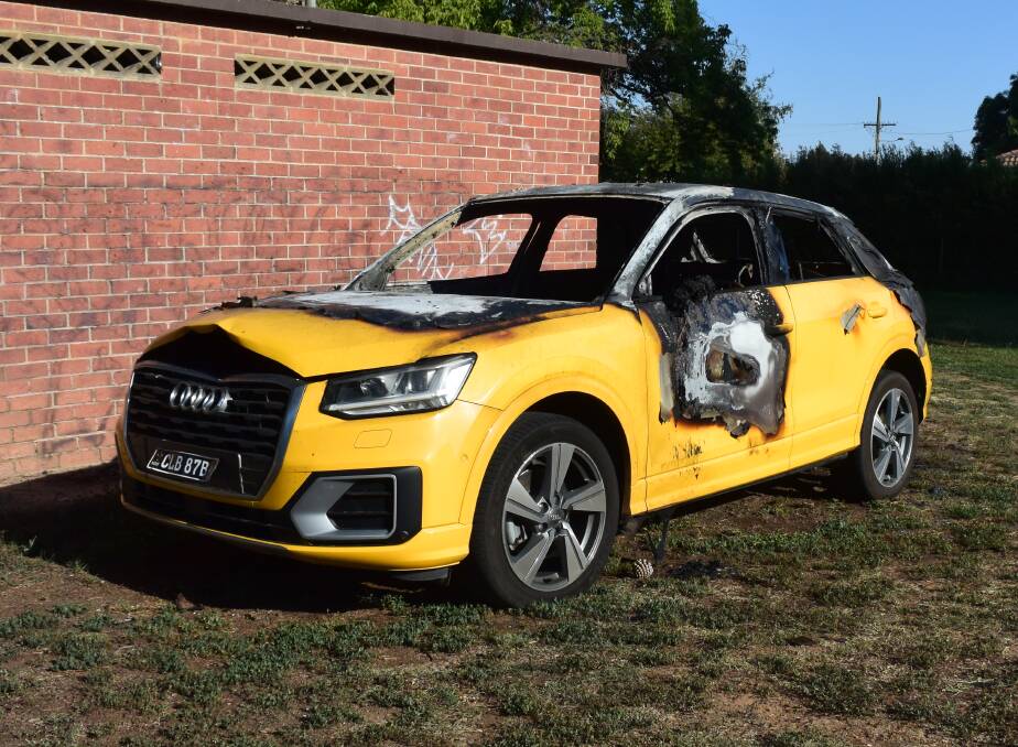 DESTROYED: This Audi was set alight after being left in Newman Park overnight. Photo: DAVID FITZSIMONS