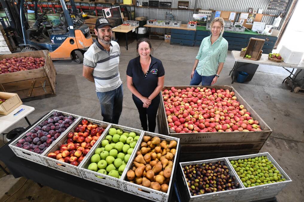 FOOD: Dr Michael Sobotta, Paula Charnock and Charlotte Gundry with a selection of the Orange region's produce to be celebrated at FOOD Week. Photo: JUDE KEOGH