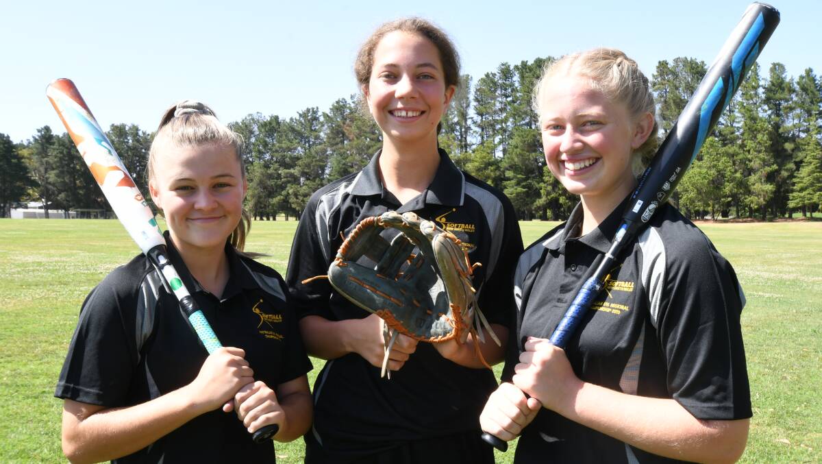 EXCITED: Alana Tracey, Ineke Keed and Montana Griffith will be competing in the Australian titles. Photo: JUDE KEOGH 0102jksoftball1