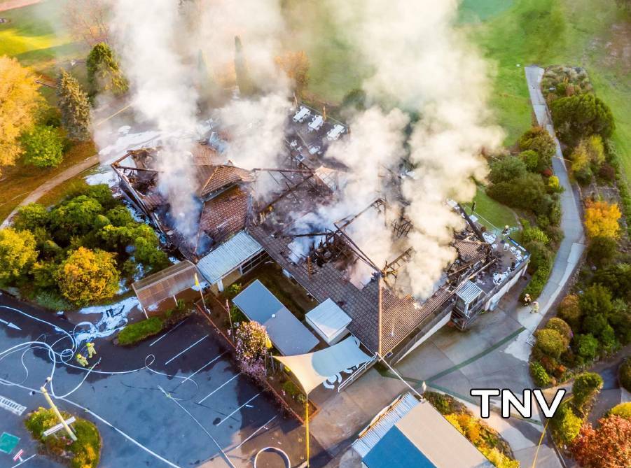 SMOULDERING: Wentworth Golf Club clubhouse from above. Photo: TROY PEARSON/TOP NOTCH VIDEO