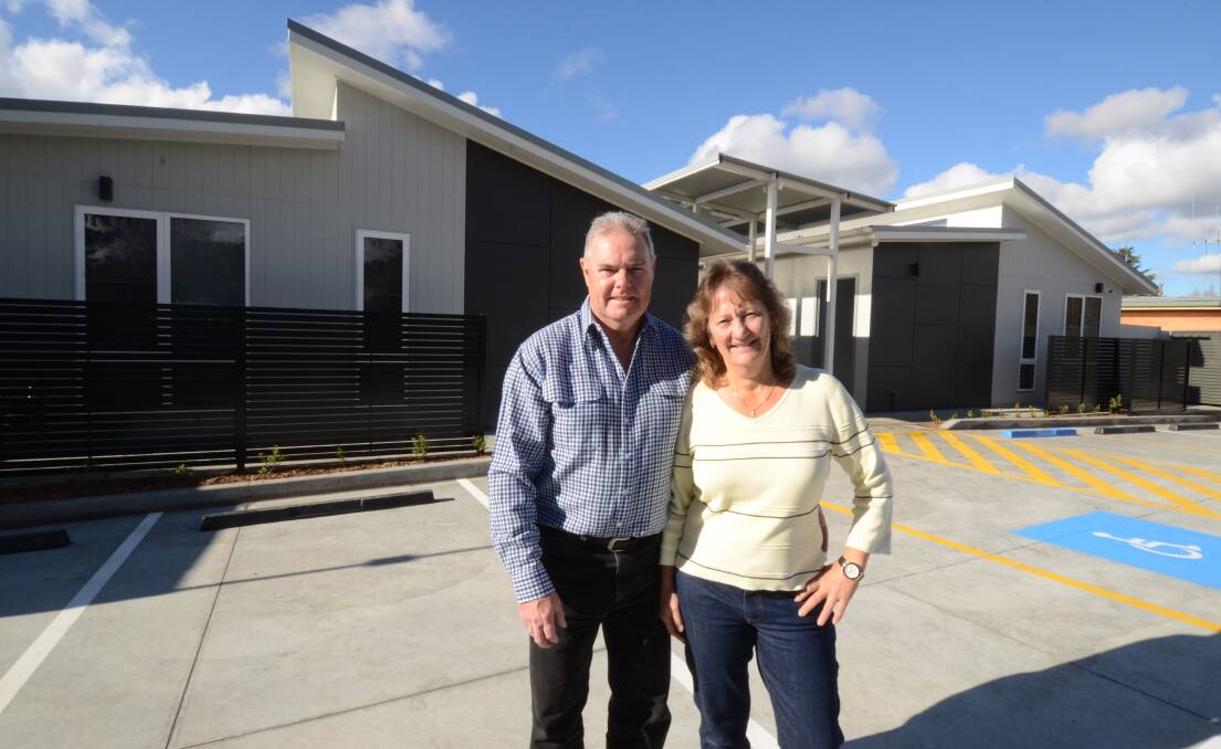 OWNERS: Greg Kings with wife Karen at the Mitchell Suites complex. Photo: JUDE KEOGH