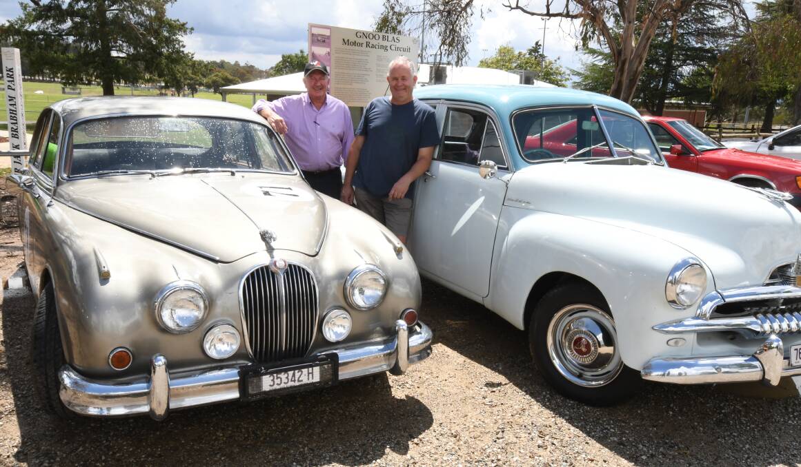 THE OLD DAYS: Graham Barrett and his 1964 Jaguar Mark 2 and Ray Hallett with a 1954 FJ Holden special, cars similar to those that ran at Gnoo Blas in 1960. Photo: JUDE KEOGH