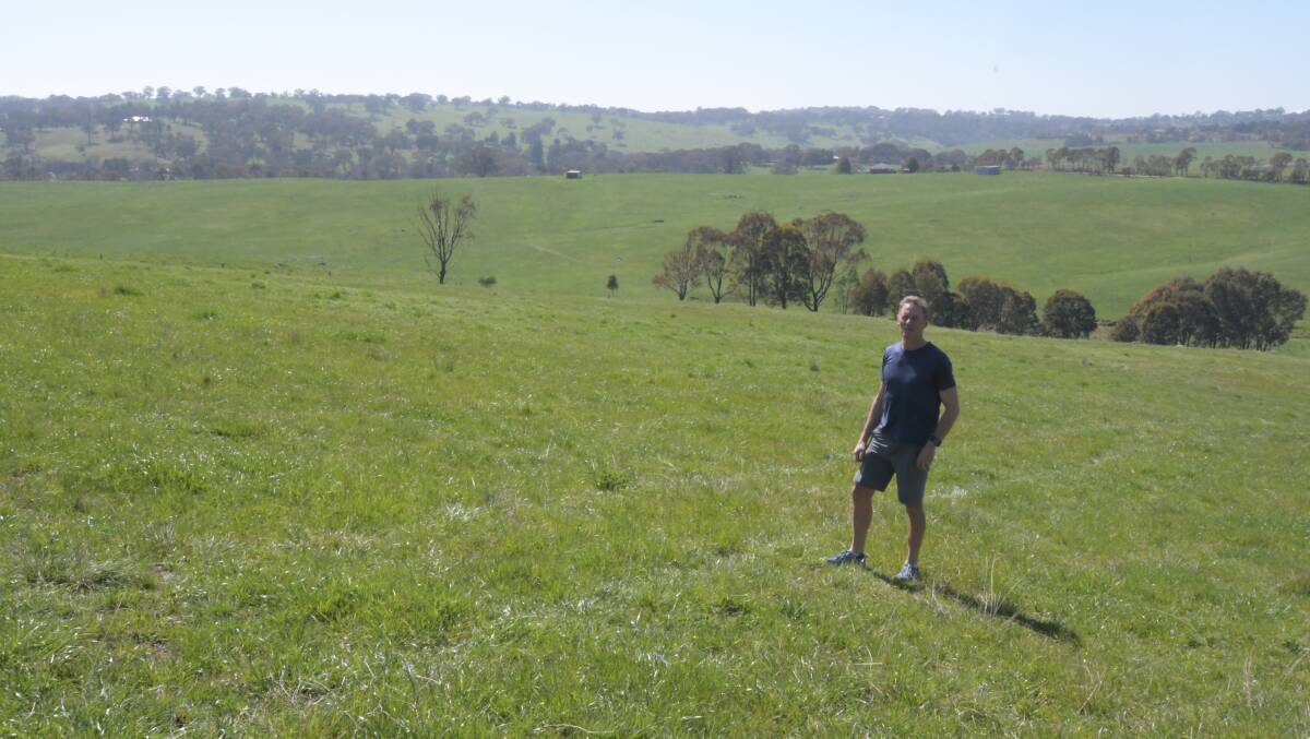 OPPONENT: Rob Green on his property overlooking the planned site of the solar farm near Orange. Photo: JUDE KEOGH