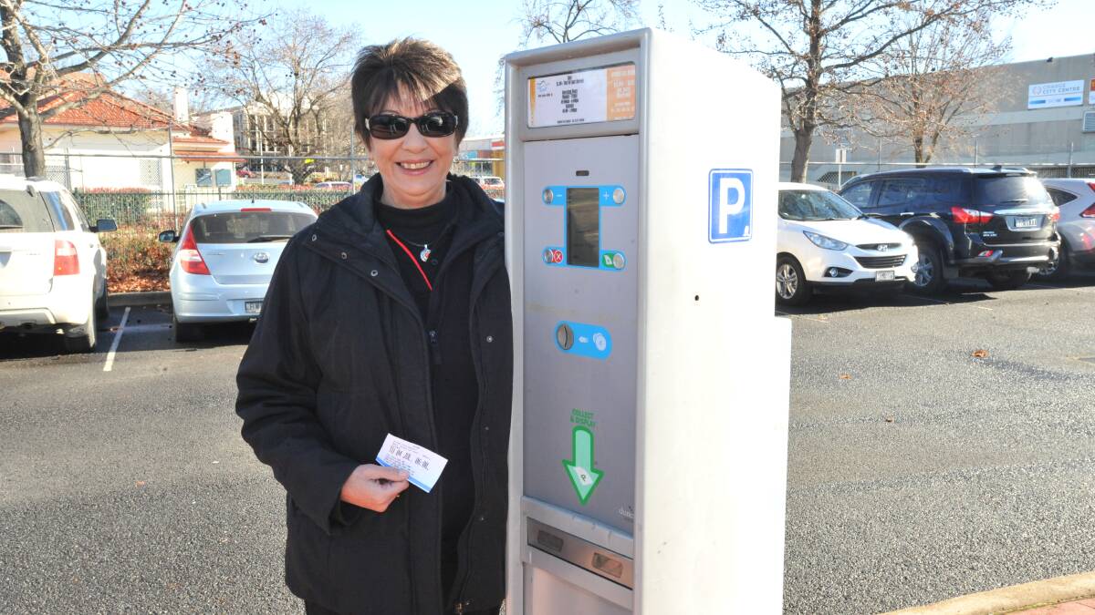 CHANGE NEEDED: Debbie Bowman said cutting the daily fee in the Ophir car park would help drivers. Photo: JUDE KEOGH 0704parking1