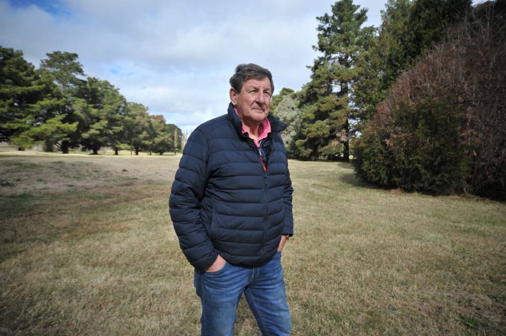 FOR THE FUTURE: Orange mayor Cr Reg Kidd on the site of the planned sports precinct on a former golf course at Bloomfield near Orange Hospital. Photo: JUDE KEOGH