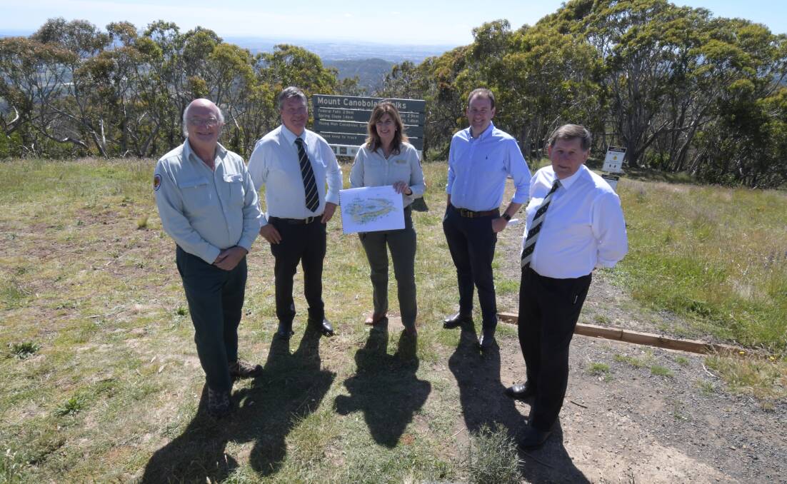 LOOKOUT: Steve Woodhall, Cr Kevin Beatty, Fiona Buchanan, Sam Farraway MLC and mayor Reg Kidd on Mount Canobolas where a lookout will be built. Photo: JUDE KEOGH