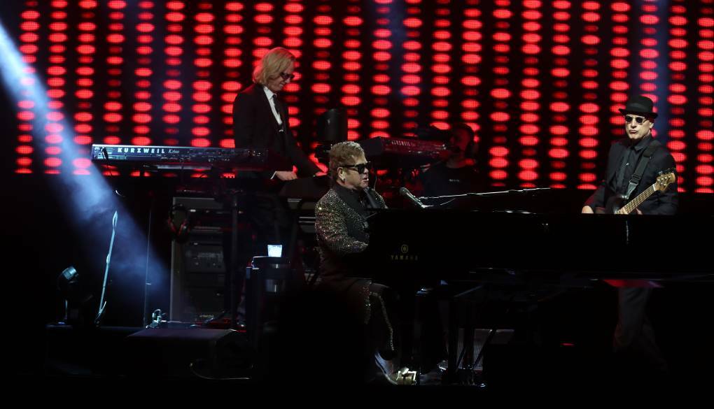 CAPTAIN FANTASTIC: Elton John and bandmembers perform at Wollongong during his last tour. Photo: ILLAWARRA MERCURY