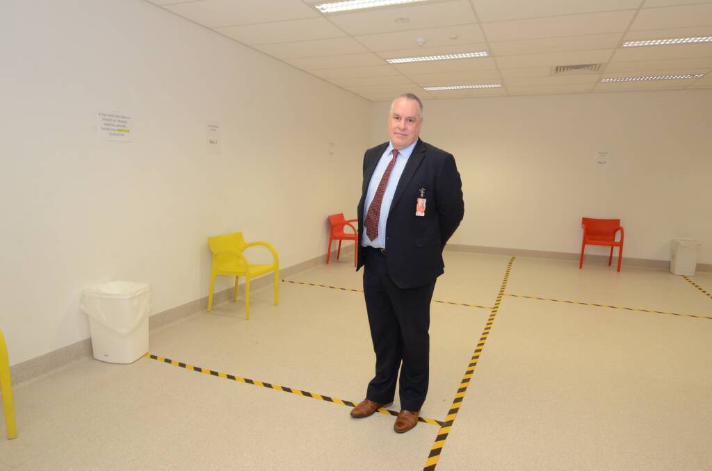 ALL QUIET: WNSWLHD executive director of operations Mark Spittal inside the coronavirus testing centre at Orange hospital. Photo: JUDE KEOGH