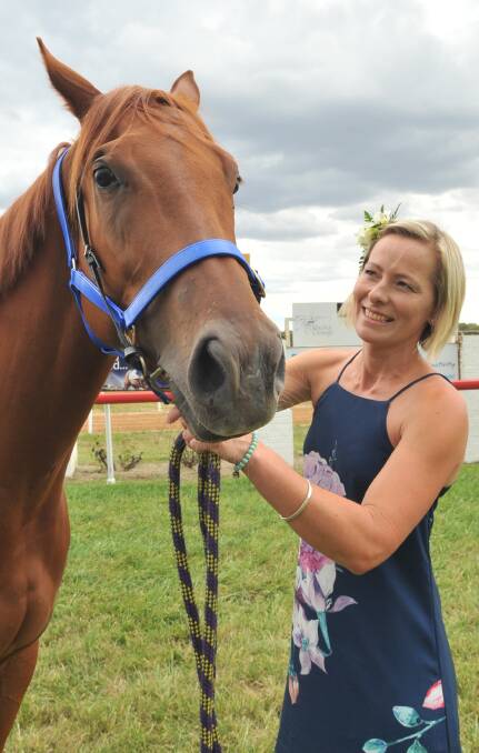 IN FASHION: Bree McMinn with Ephriam ahead of Saturday's Picnic Race Day at Towac Park where fashions and fun will unite with racing and fund raising. Photo: JUDE KEOGH