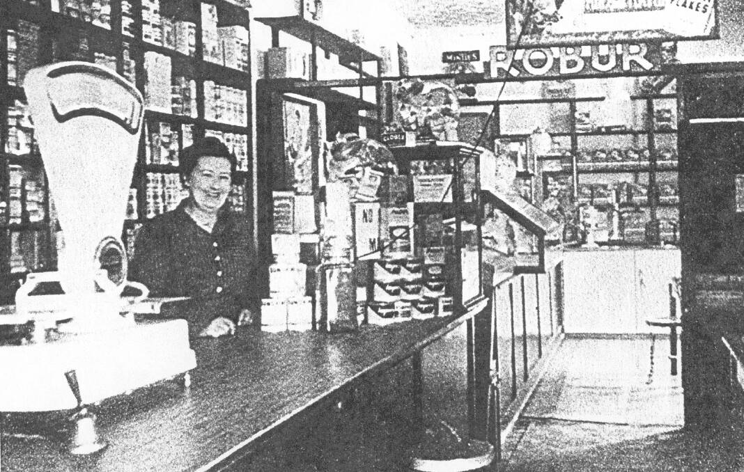 OLD WORLD: Mrs Egan inside her store at the corner of Hill and Summer streets. Photo: Orange District Historical Society.