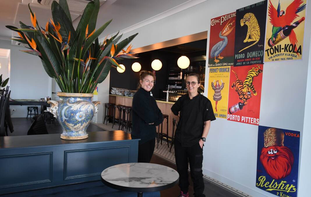 NEW NOSHERY: Leah Morphett and Simonn Hawke in front of the bar at Birdie. Photo: JUDE KEOGH