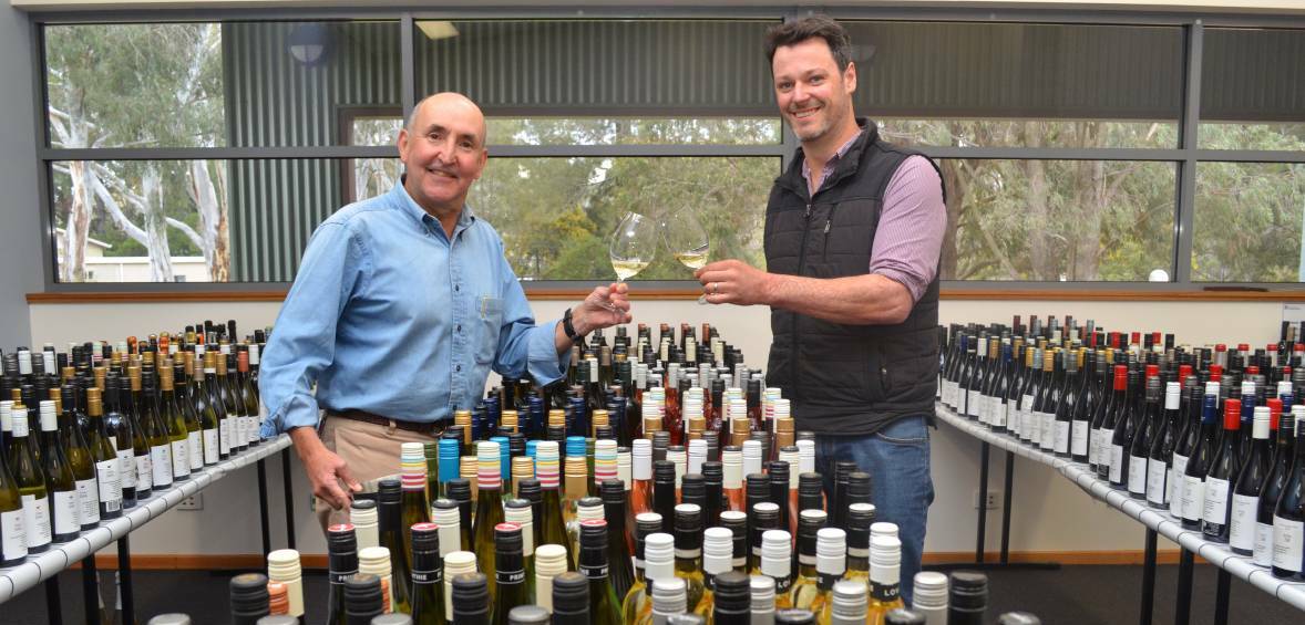 TASTE TEST: Chair of the 2018 Orange Wine Show committee Justin Byrne and Chief Steward William Rikard-Bell at last year's judging. Photo: ALEX CROWE