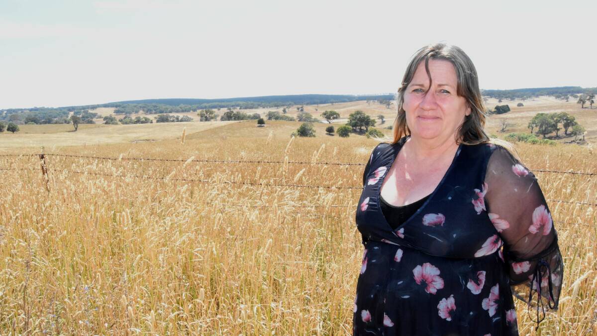 IMPORTANT SITE: Lisa Paton in front of an area that contains Aboriginal sites and will be covered by the tailings dam if the mine is approved. 
