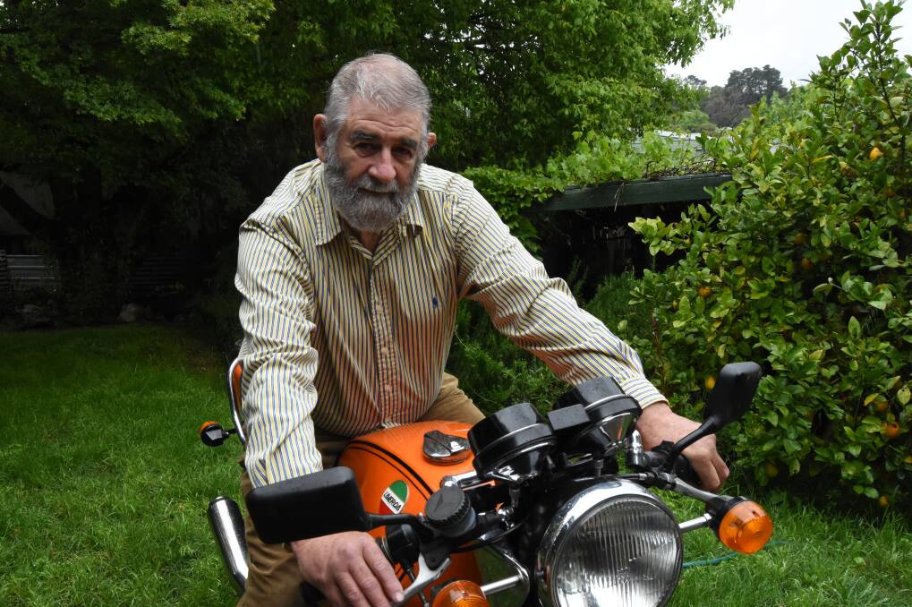 POWERFUL: Chris Moloney on his 1000cc Laverda motorcycle that he'll be showing at the inaugural Millthorpe Bike Show. Photo: Mark Logan.