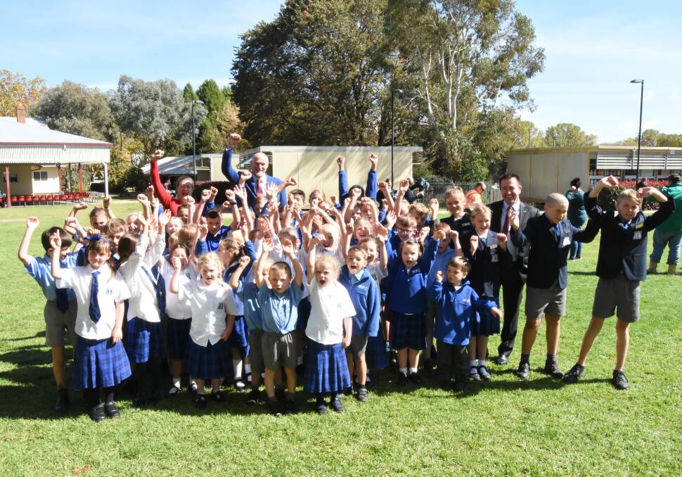 CELEBRATING: The younger students at Millthorpe Public School will witness a massive transformation of the school over the coming years. Photo: MARK LOGAN