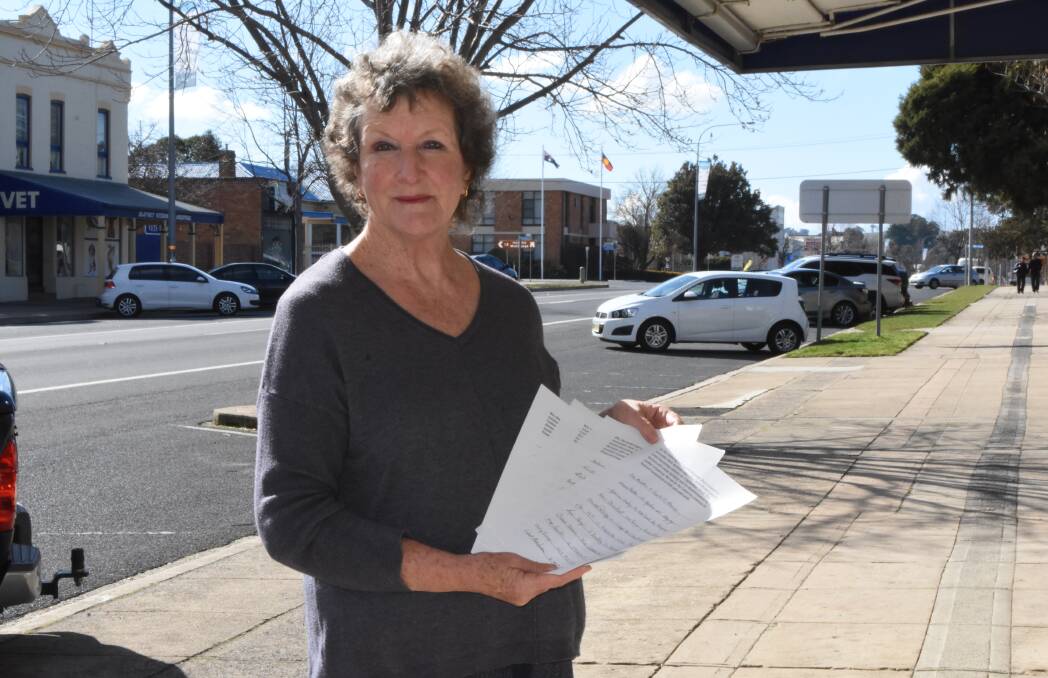 DRIVING FORCE: Lesley Barnes with the petition she has begun against the card-only transactions at Blayney's Centrepoint pool and the waste management facility.