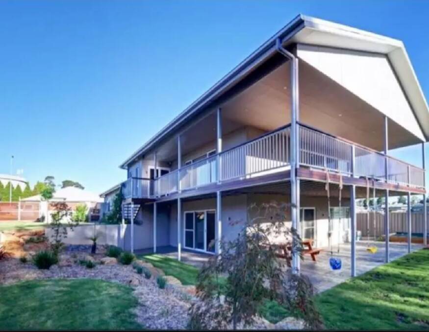 This beautiful home has a lovely outlook over Wentworth Golf Course. Photo: Airbnb