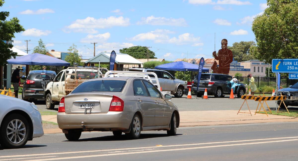 TESTING: A queue has formed outside the Big Bogan in Nyngan on Tuesday afternoon, after a man who tested positive for COVID-19 travelled through the town over the weekend. Photo: CONTRIBUTED
