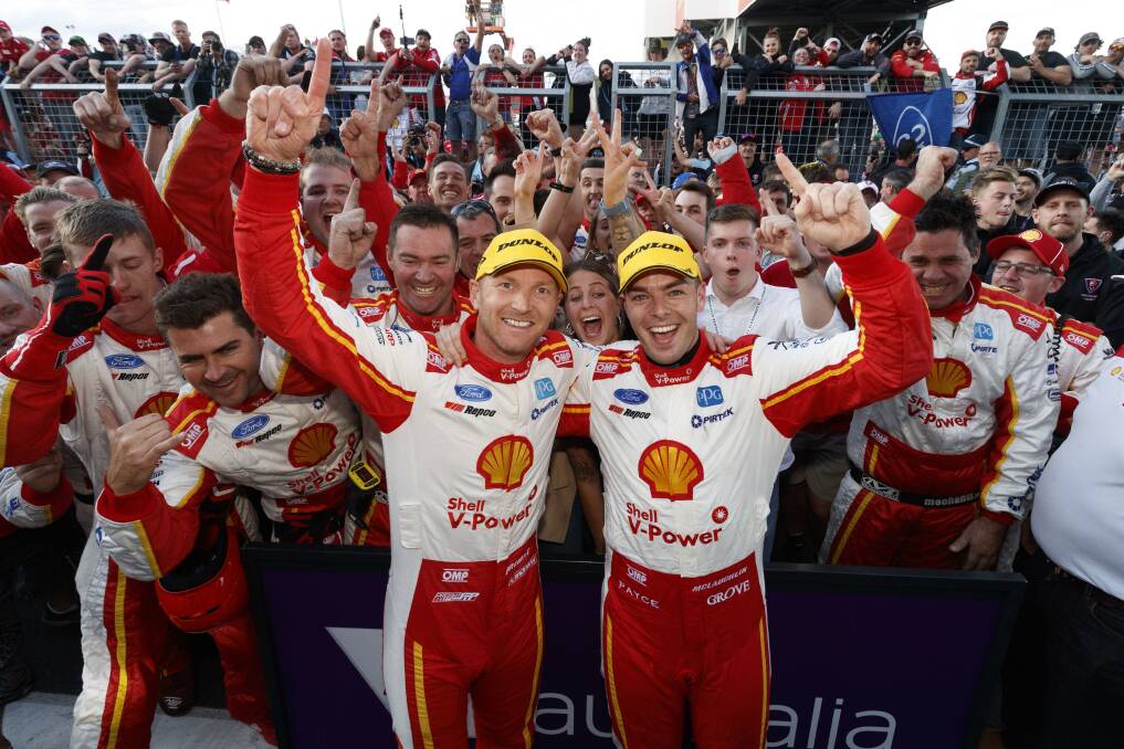 YOU BEAUTY: Alex Premat, Scott McLaughlin and their Shell V-Power Racing crew celebrate their Bathurst 1000 victory.