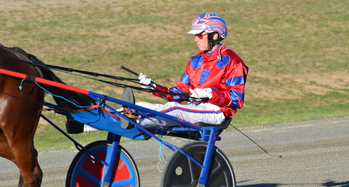 HEAT IS ON: Mitch Turnbull drove a pair of heat winners for his trainer-father Steve Turnbull at Blayney on Sunday. Both Rainbow On Fire and The Rath advanced to the decider. Photo: ANYA WHITELAW