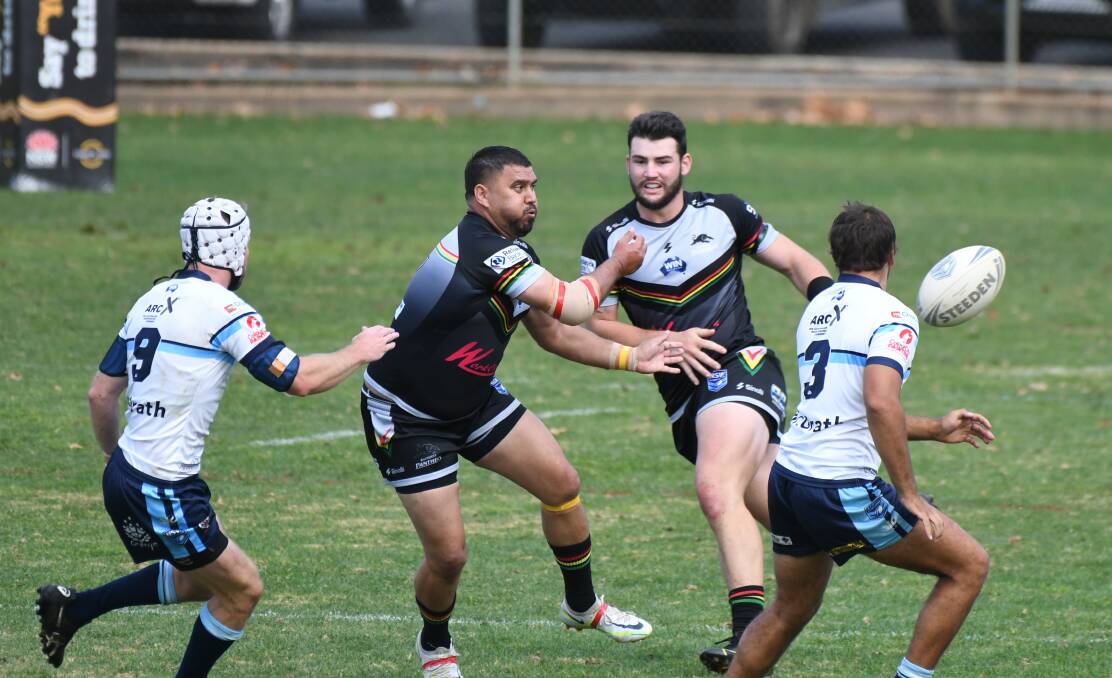 MEN IN BLACK ATTACK: Bathurst Panthers posted a 46-4 win over Orange Hawks. Photos: CHRIS SEABROOK