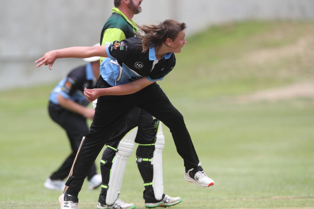 MULLET OF GOLD: City Colts' Mark Sheather not only rocks this mullet, but he conceded just eight runs off his five overs on Saturday. Photo: PHIL BLATCH