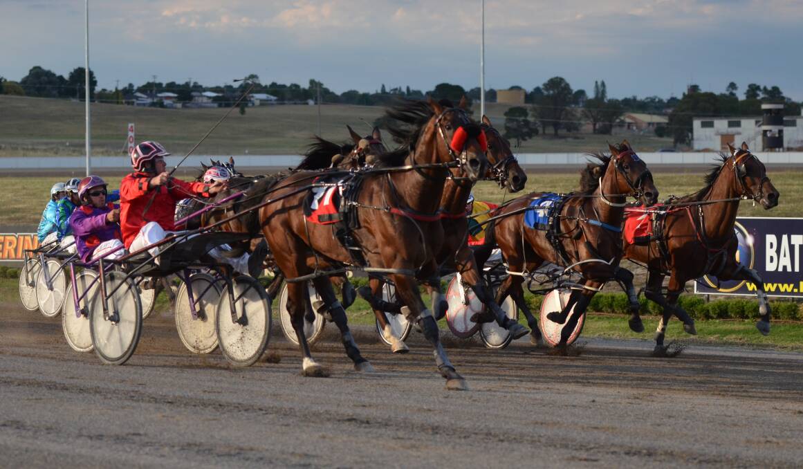 ON THE CHARGE: Aaron Garaty guides In The Extreme (#11) to his first win for Bathurst trainer Steve Jones. Photo: ANYA WHITELAW