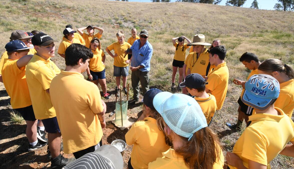Molong Central School students helped regenerate an old quarry at Cudal with native tree plantings.